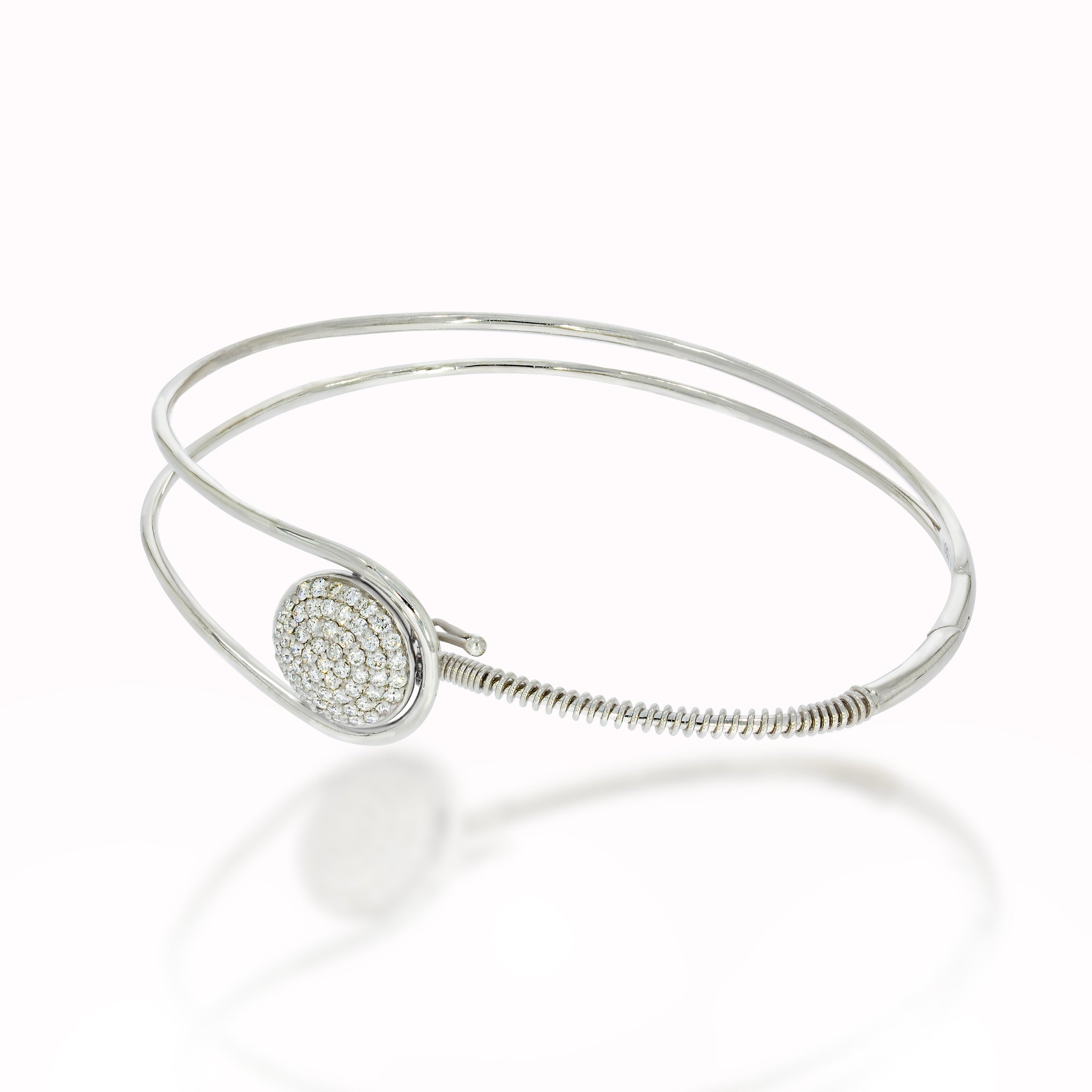 Resplendent 18k white gold bangle bracelet, set with round resplendent studded 0.63ct round diamond. Perfect for Bridel waer.