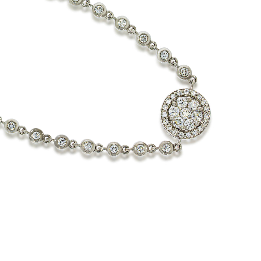 Bezel-set round diamonds in a flexible white gold bracelet. Adjustable Tie Bracelet.  beautiful flower pave diamonds halo diamonds around it.