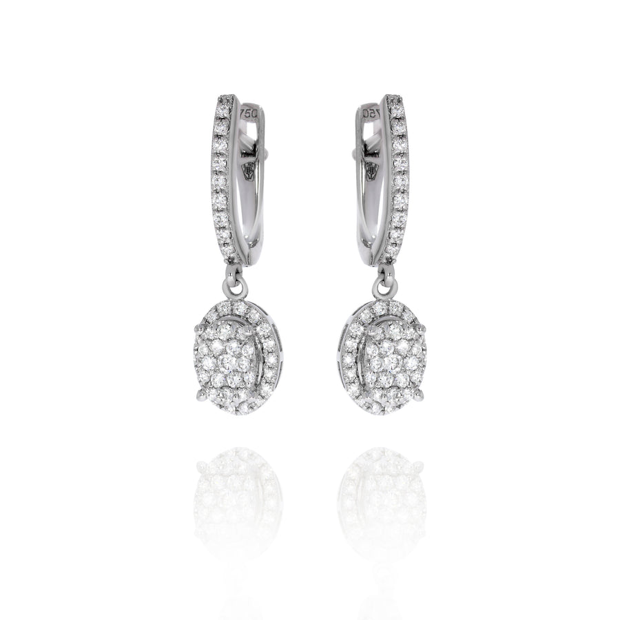 Amazingly beautiful hanging diamond earrings, horseshoe shape set with diamonds in the front And an hanging diamonds ellipse pendant.