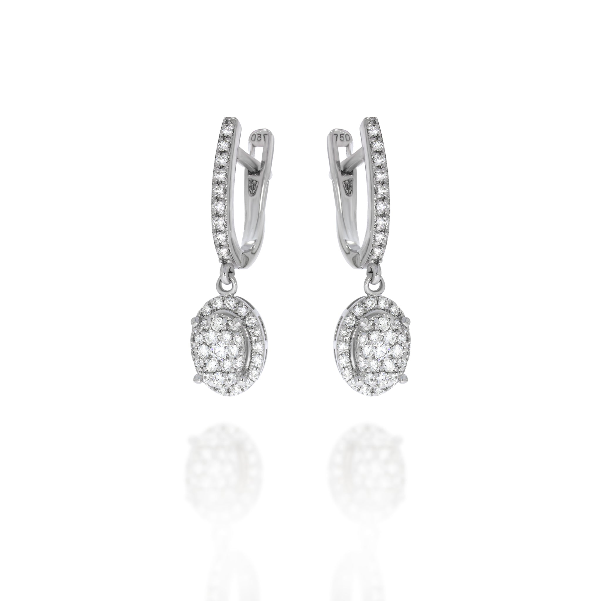 Amazingly beautiful hanging diamond earrings, horseshoe shape set with diamonds in the front And an hanging diamonds ellipse pendant.