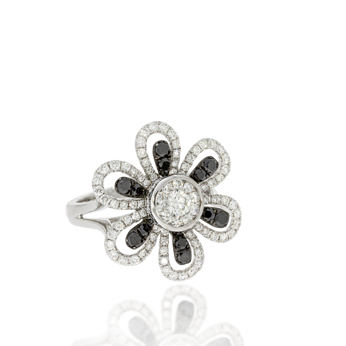 Lovely Daisy ring Daisy petals with black diamonds surrounded by white shining diamonds .